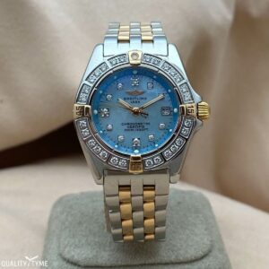 Breitling Stainless Steel & 18K Yellow Gold Ladies 29mm Windrider Callistino B72345, Factory Blue MOP Diamond Dial, Diamond Bezel, box and papers. Recently serviced